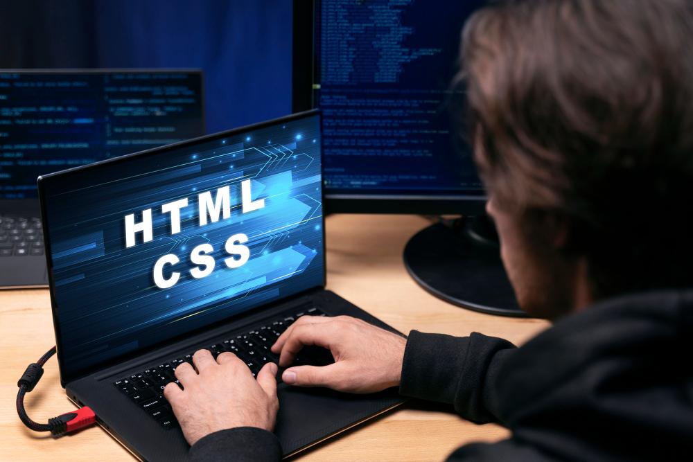 Person in front of computer working html