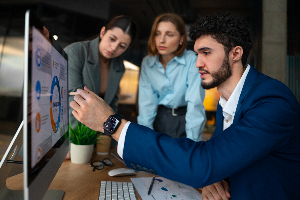 b2b seo agency employees at boss table while he is explaining way farward