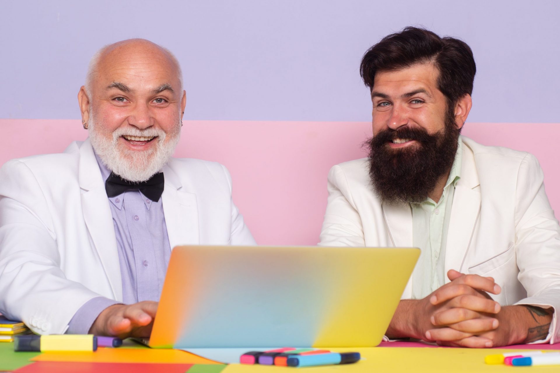 smiling-businessmen-with-laptop-working-workplace-businessman-using-pc-work-handsome-business-male-generations-ages-sitting-desk-with-laptops