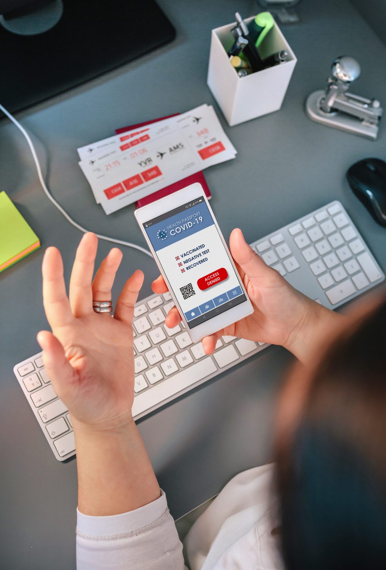 unrecognizable-woman-booking-trip-surprised-see-denied-covid-health-passport-ios app development