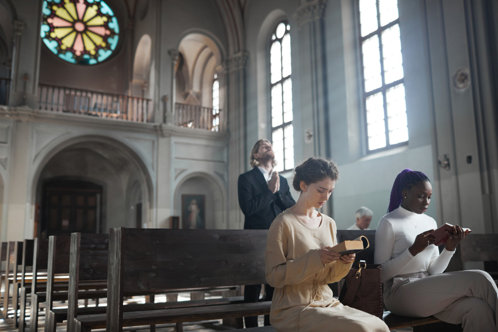 church interior photo while peopels reading book, image for church web design